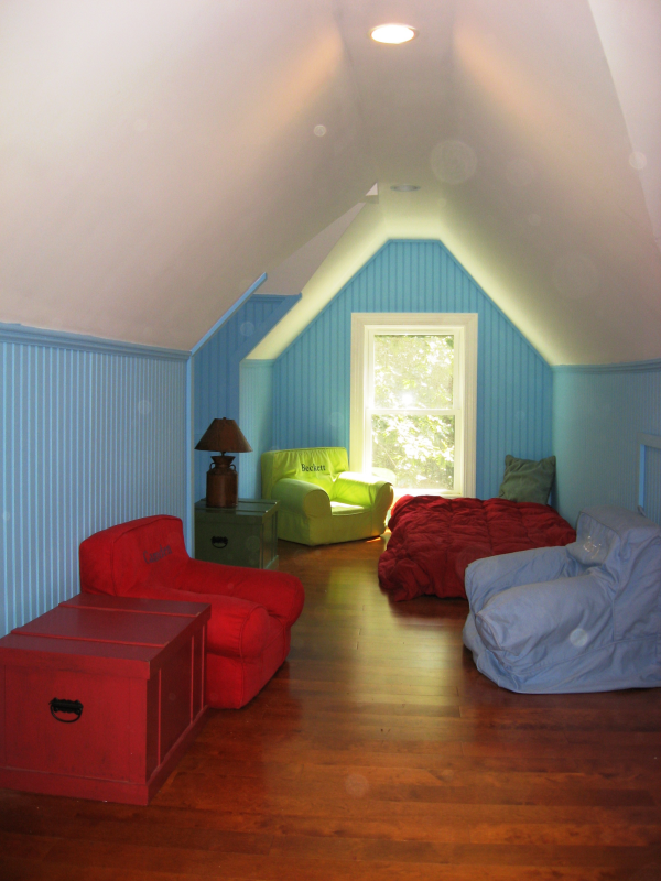 Attic view with recessed light in ceiling