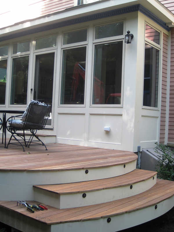 Curved stairs of new deck and addition